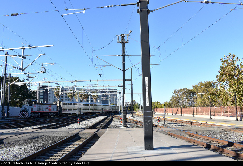 The special Caltrain move of a switcher and three Gallery cars at San Jose Diridon Station